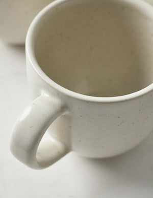 Close-up of the mug in the Pacifica Vanilla-toned Dinnerware 5-Piece Place Setting by Casafina