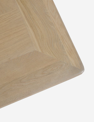 Close up corner view of the Cedro large minimalist light wood coffee table with shelf.