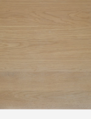 Close up view of the wood grain of the Cedro large minimalist light wood coffee table with shelf.
