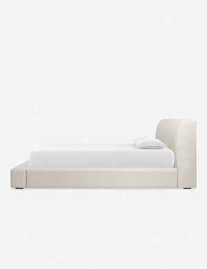 Side view of the Clayton gray upholstered platform bed