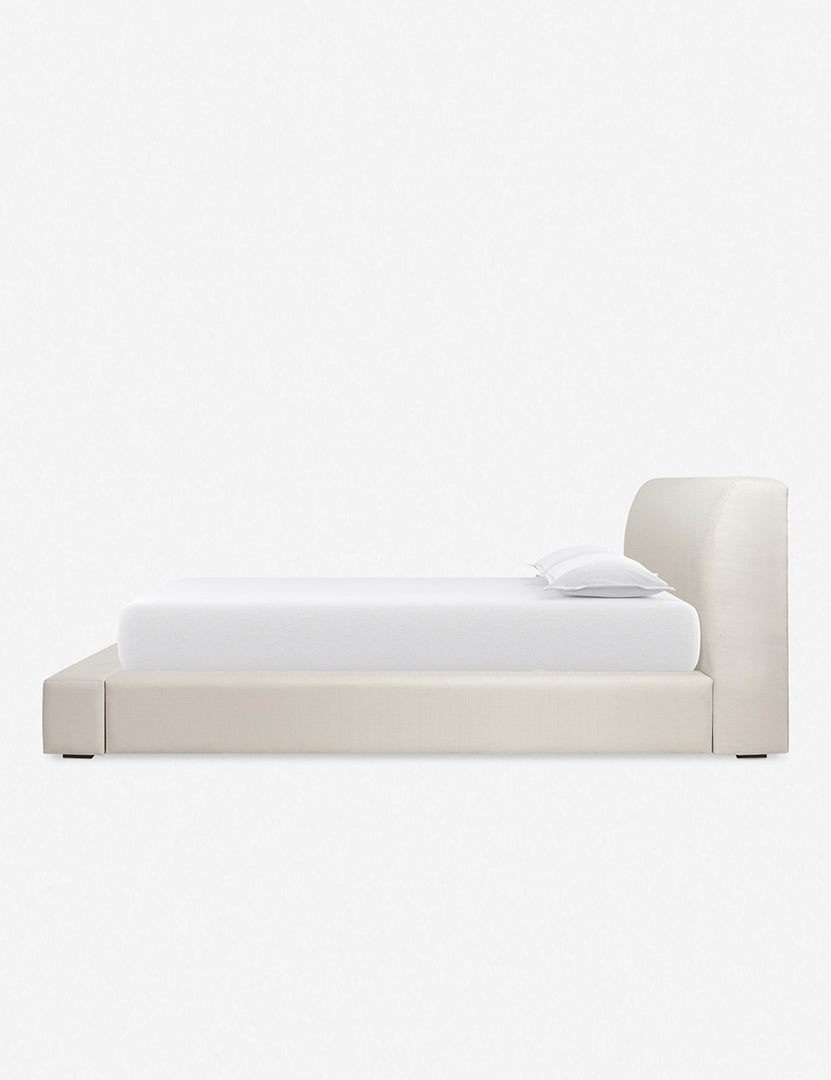 #size::queen #size::king #size::cal-king #color::ivory | Side view of the Clayton gray upholstered platform bed