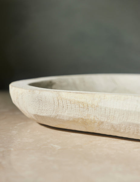 | Close-up of the left side of the Clemente whitewashed paulownia wood bowl