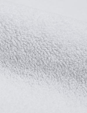 Detailed shot of the Cloud loom sustainable white bath mat by coyuchi