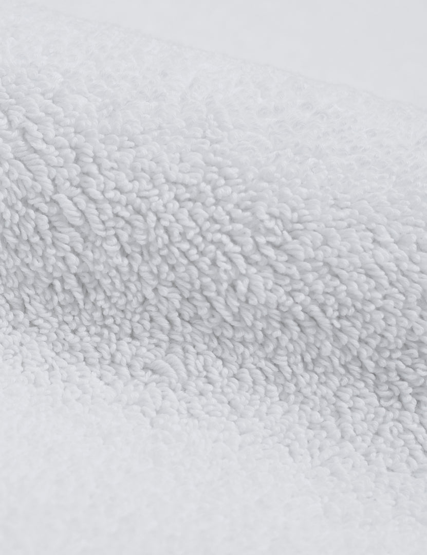#color::white | Detailed shot of the Cloud loom sustainable white bath mat by coyuchi