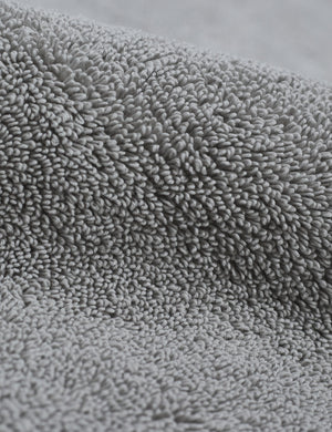 Detailed shot of the Cloud loom sustainable light gray bath mat by coyuchi
