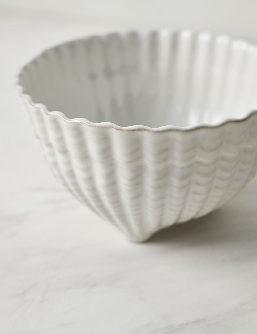 | Close-up of the Aparte white footed bowl with shell inspired design by Costa Nova