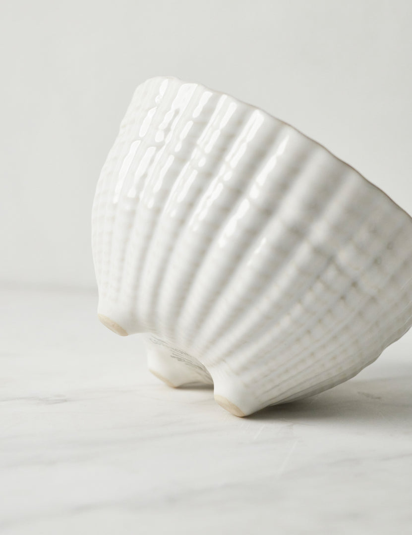 | Close-up of the Aparte white footed bowl with shell inspired design by Costa Nova