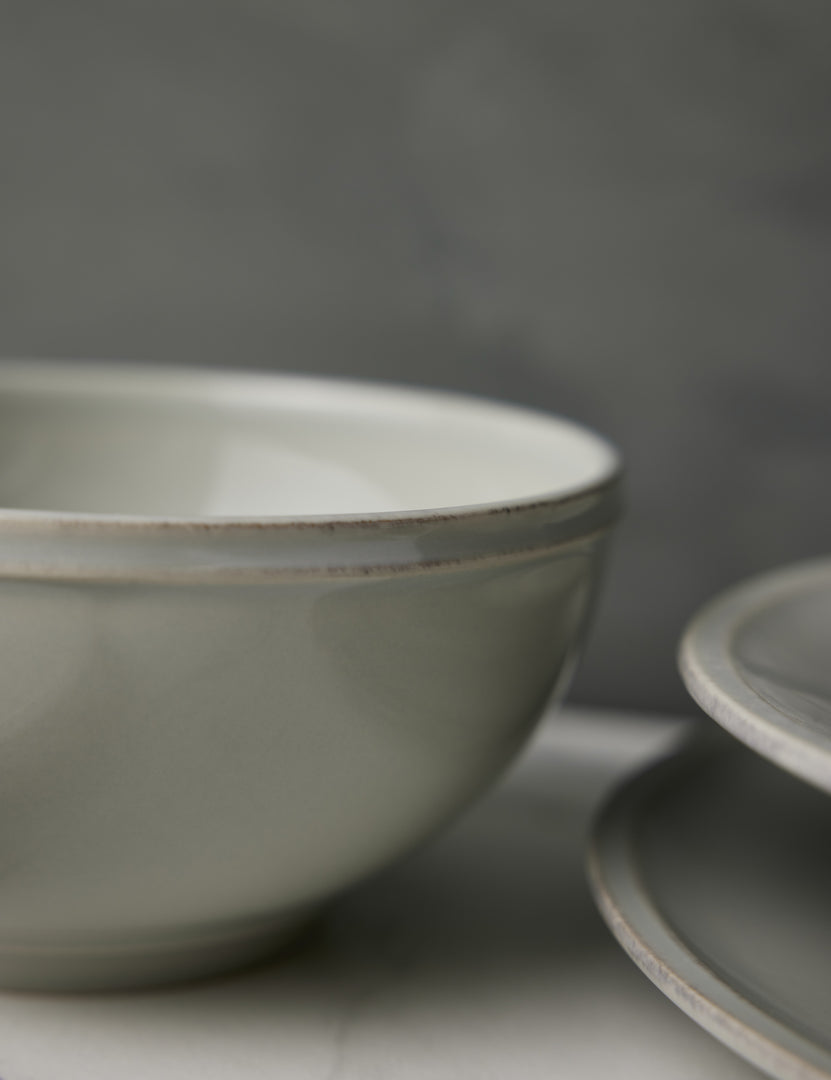 #color::grey | Close-up of the grooved edge on the Friso grey dinnerware 5-piece place setting by Costa Nova