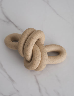 Close-up of the Double Loop Knot stoneware decorative object by SIN