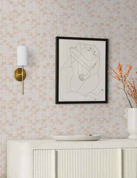#color::taupe-+-ivory | Taupe and ivory Checkerboard Wallpaper by Sarah Sherman Samuel is in a room with a white console table and an abstract wall art of two people