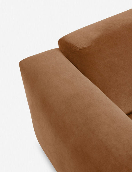 #color::Rust | Where the arm and back-cushions of the Eleanor rust orange Velvet sofa connect