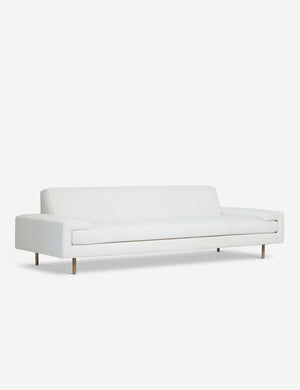 Angled view of the Estee white linen upholstered sofa