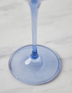 Close-up of the base and stem of the cobalt blue wine glass by Estelle Colored Glass