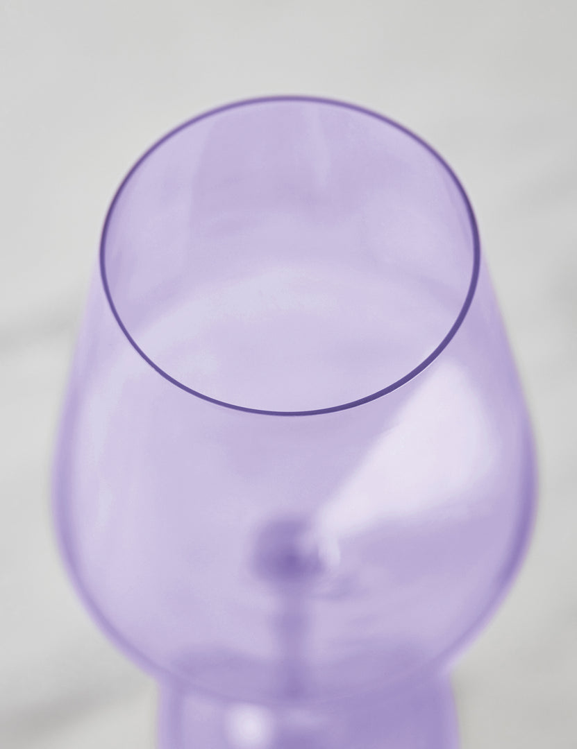 #color::lavender | Angled view of a lavender purple wine glass by Estelle Colored Glass
