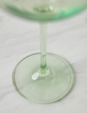 Close-up of the base and stem of the mint green wine glass by Estelle Colored Glass