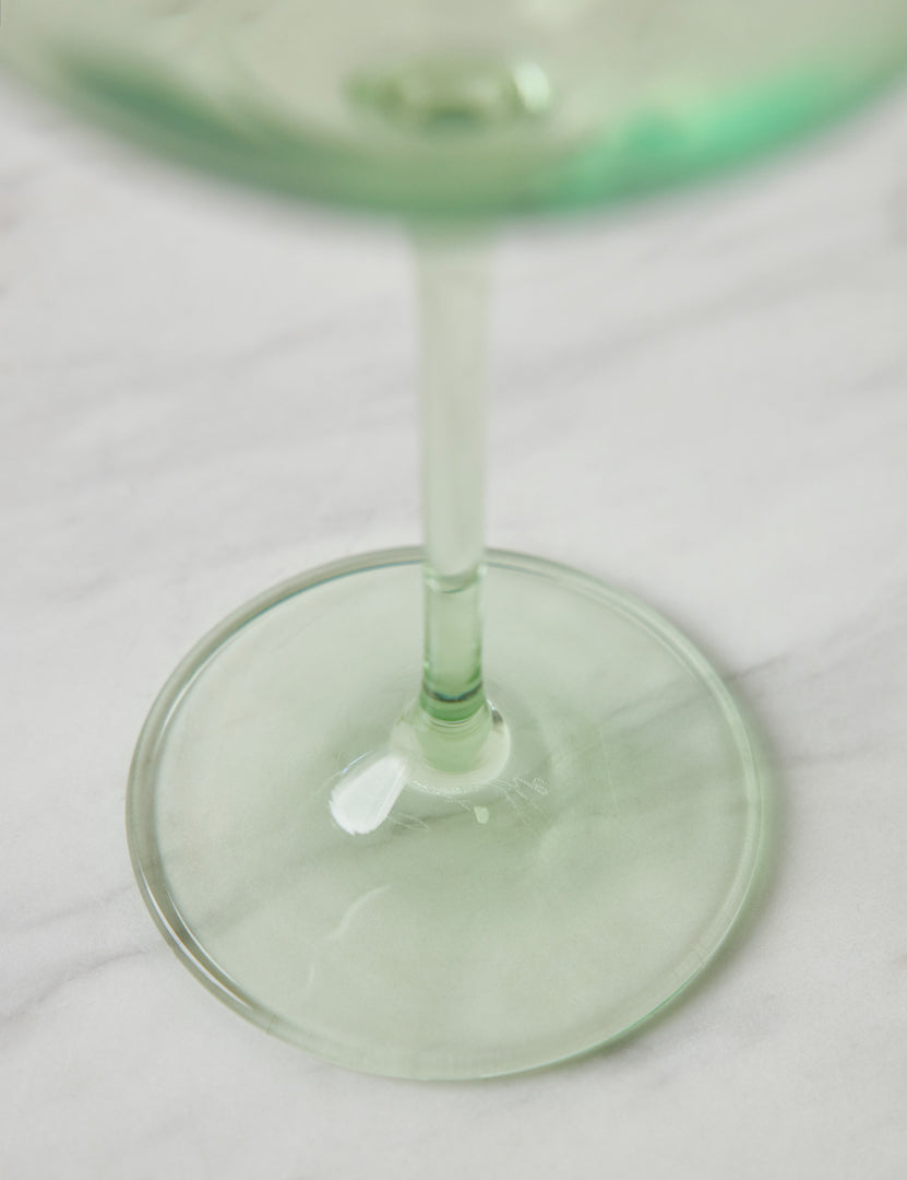 #color::mint | Close-up of the base and stem of the mint green wine glass by Estelle Colored Glass
