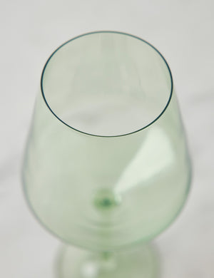 Angled view of a mint green wine glass by Estelle Colored Glass