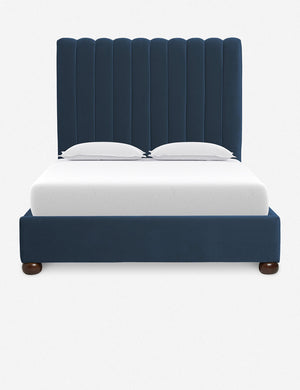 Blue Evelyn Platform Bed with a channel-tufted headboard