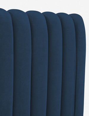 Close up of the channel-tufted headboard on the Blue Evelyn Platform Bed
