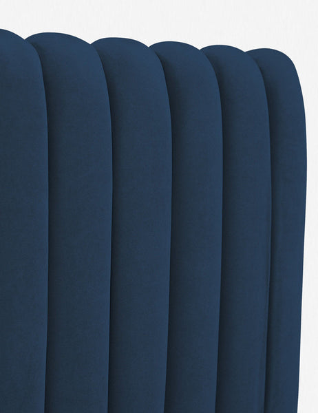#size::queen #size::king #size::cal-king #color::blue | Close up of the channel-tufted headboard on the Blue Evelyn Platform Bed