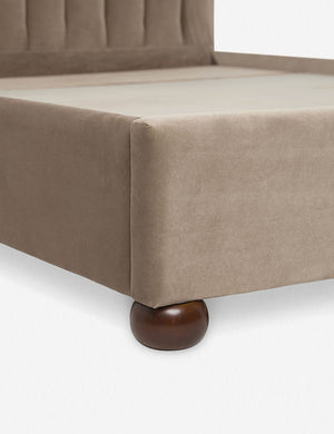 Close up of the corner and round wooden legs of the Toffee Brown Evelyn Platform Bed
