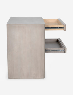 Side view of the Arabel light wood open nightstand with its two pull-out drawers open