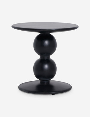 Genesis round black sculptural side table.