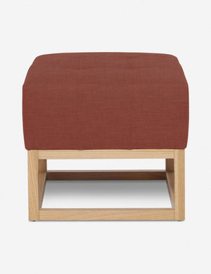 Terracotta Linen Grasmere Ottoman with an upholstered cushion and airy wooden frame by Ginny Macdonald