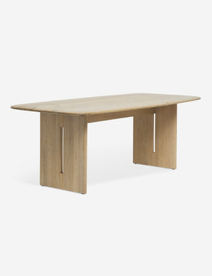 Henrik light wood six person rectangular dining table with visible joinery and rounded edges