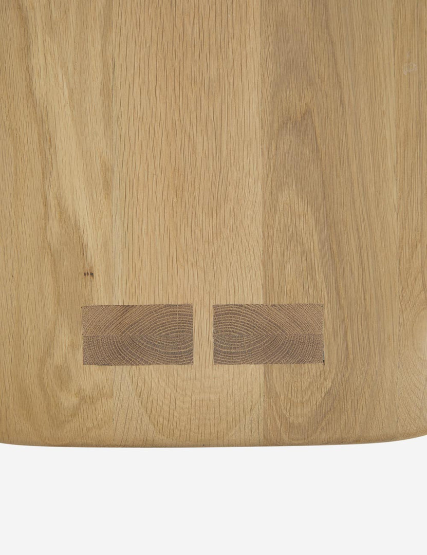 | Wood detailing on the legs of the Henrik light wood stool