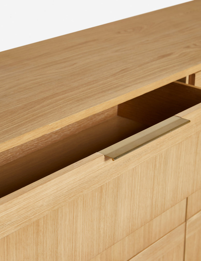 | The top drawer of the Hillard 6-drawer dresser slightly open