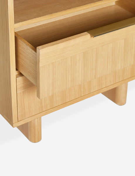 | Close-up view of an open shelf on the bottom of the Hillard white oak veneer nightstand