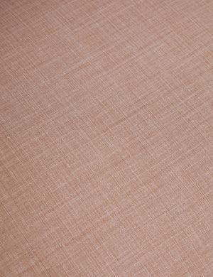 Detailed shot of the apricot linen fabric on the Hollingworth Sofa