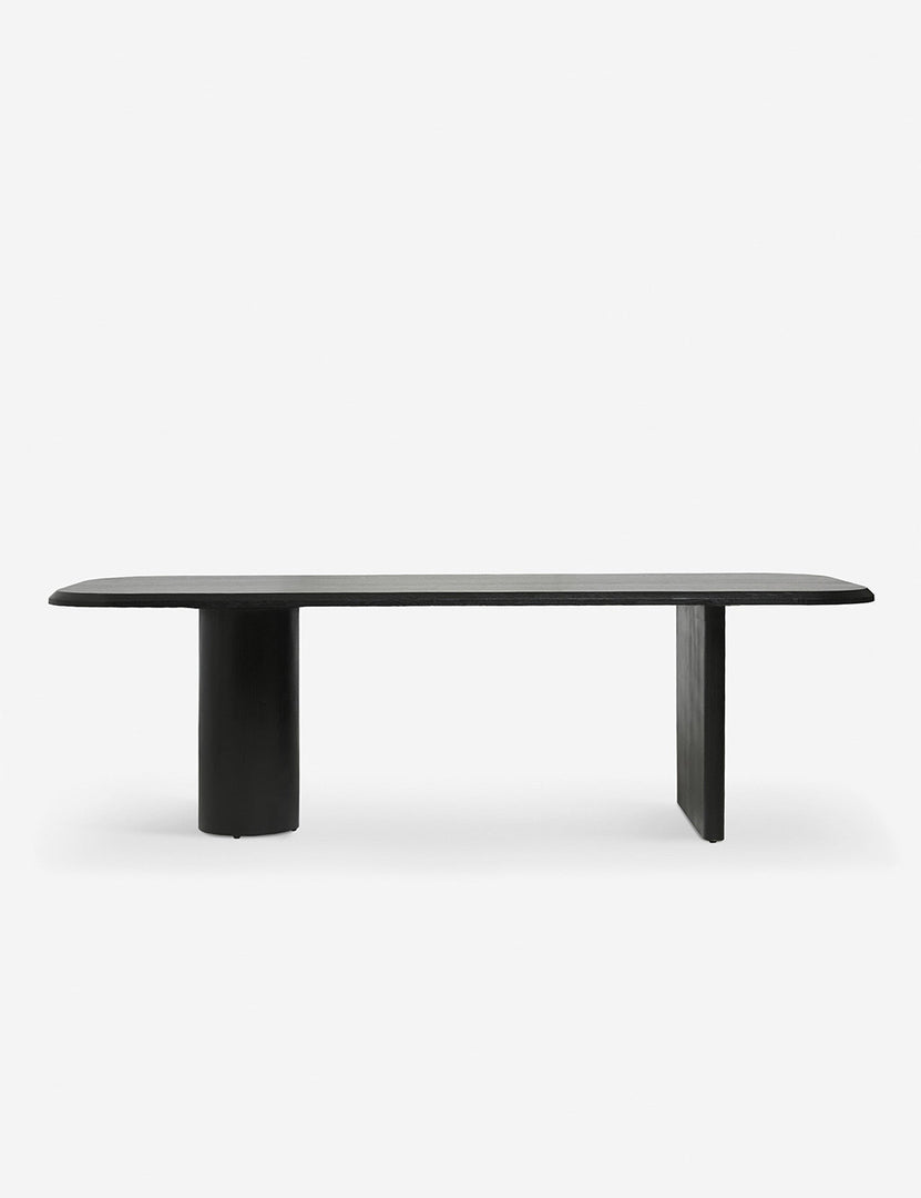 #color::black #size::96-W | Archer Black Rectangular Dining Table with a flat slab-style leg and a cylindrical leg by Sarah Sherman Samuel