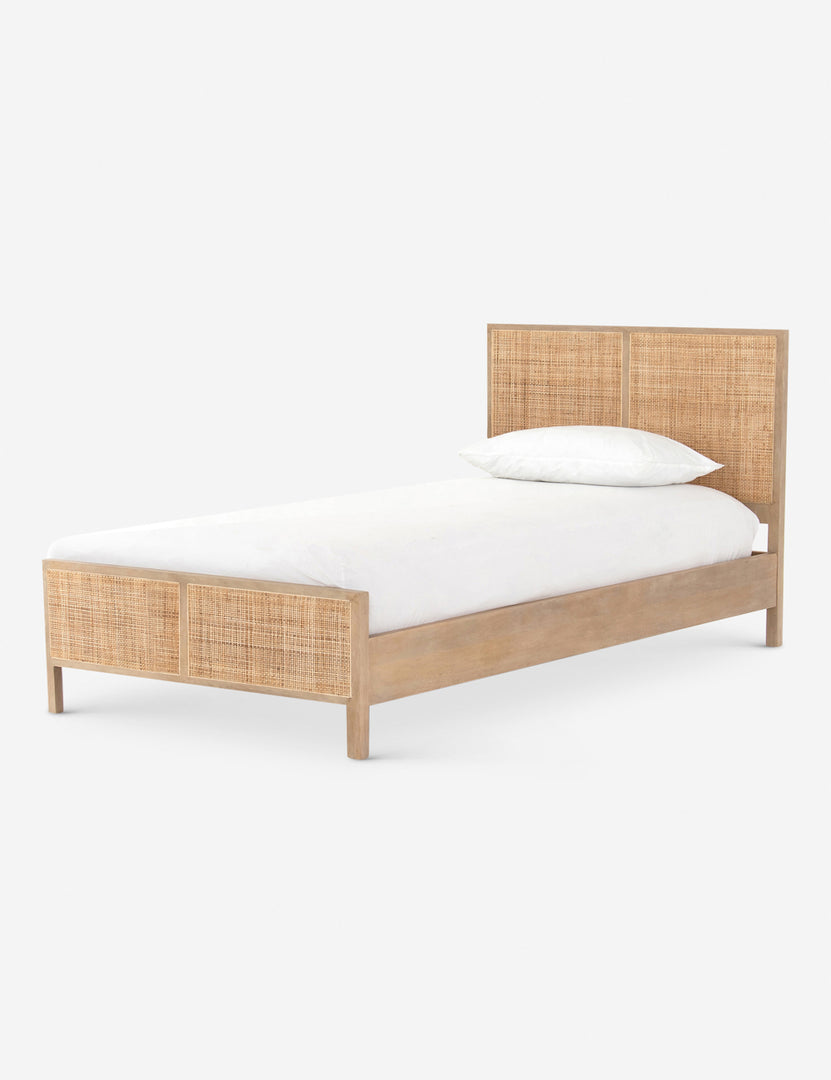 #color::natural #size::twin | Side view of the Hannah bed with light wood cane bed frame.