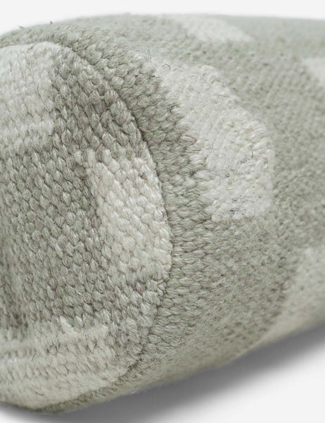 #color::khaki | Angled close up of the Irregular khaki green and white Checkerboard Bolster Pillow by Sarah Sherman Samuel
