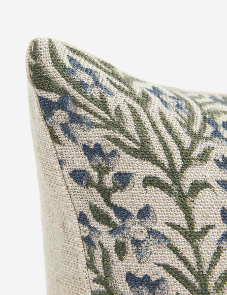 #style::square | Close-up of the corner of the Ixora square pillow with ornate floral pattern