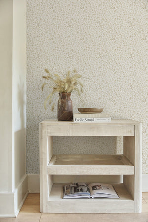 The Sommerville natural wallpaper is in a room with a whitewashed sideboard with two open shelves