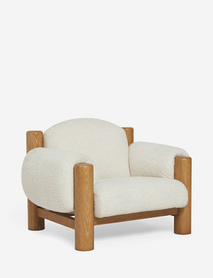 Angled view of the James faux sherpa accent chair