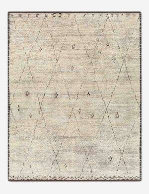 Rosanne ivory hand-knotted rug with a dark border, a thin lattice motif, and accent detailing