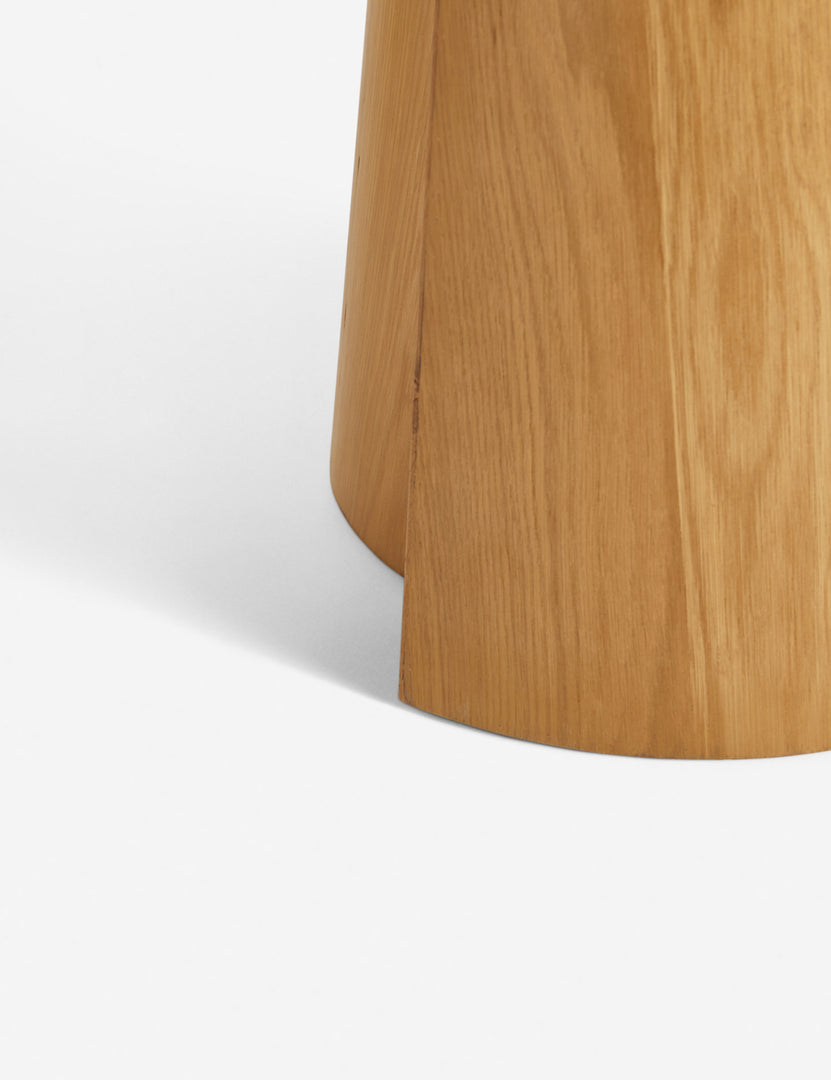 #color::natural #size::48- | The base of the Pau oak veneer round dining table