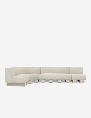 Lena left-facing white boucle sectional sofa with upholstered beam legs.