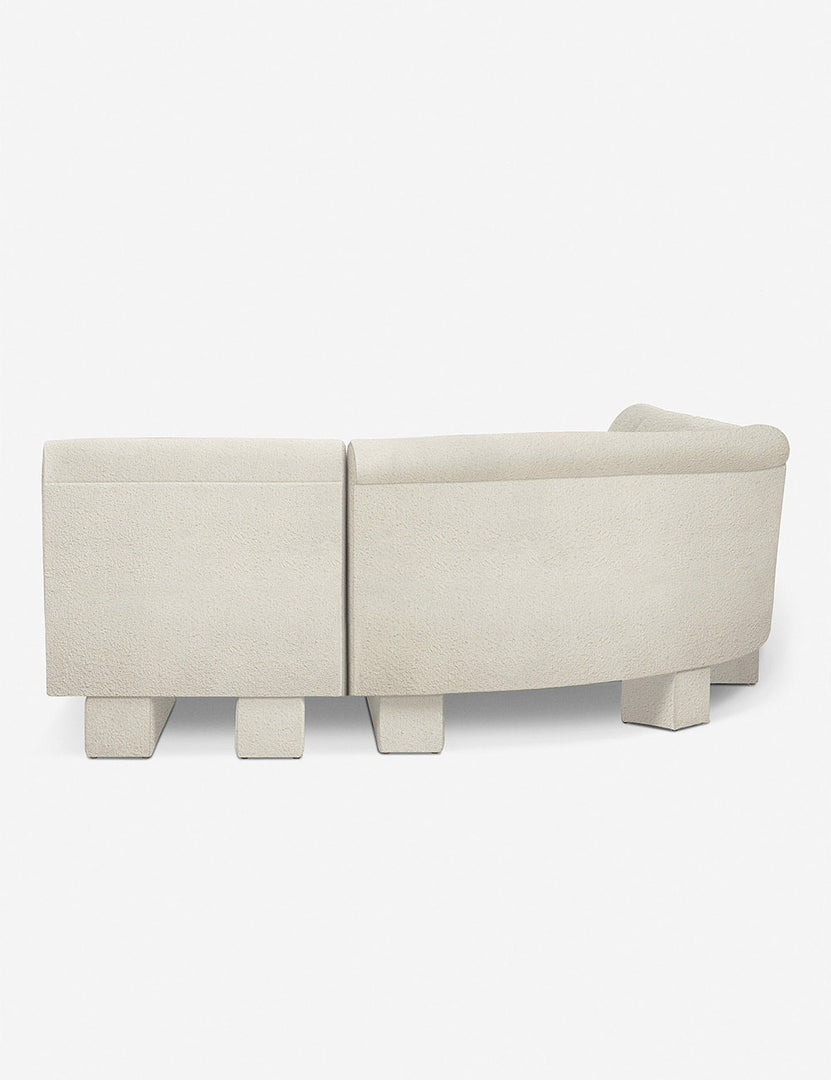 #color::Ivory-Boucle #configuration::right-facing #size::142-W | Rear view of the side of the Lena right-facing white boucle sectional sofa with upholstered beam legs.
