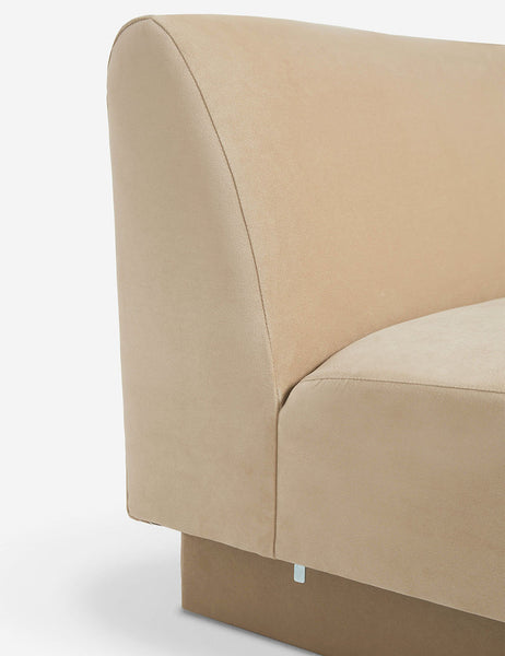 #color::Brie-velvet #configuration::left-facing #configuration::right-facing #size::142-W #size::114-W | Side view of the  Centerpiece of the Lena beige velvet sectional sofa with upholstered beam legs