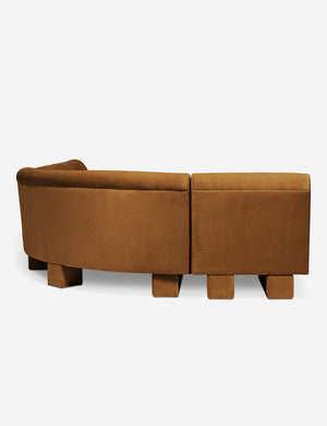 Rear view of the side of the Lena right-facing cognac velvet sectional sofa with upholstered beam legs.