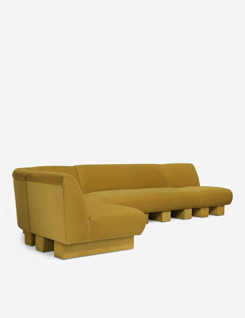 #color::Goldenrod-velvet #configuration::left-facing #size::142-W | Angled view of the Lena left-facing yellow velvet sectional sofa with upholstered beam legs.