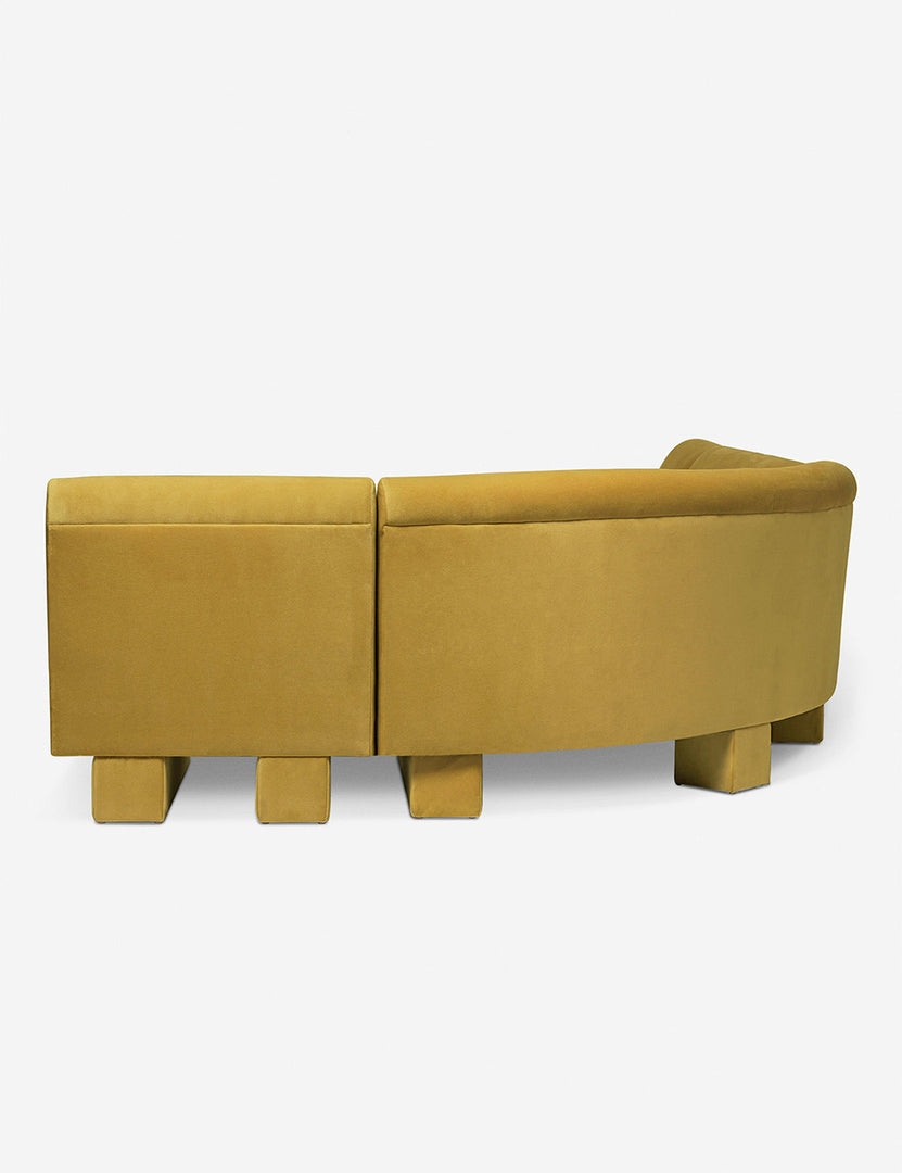 #color::Goldenrod-velvet #configuration::left-facing #size::142-W | Rear view of the side of the Lena left-facing yellow velvet sectional sofa with upholstered beam legs.