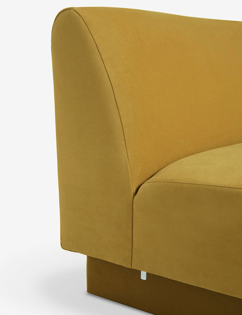 #color::Goldenrod-velvet #configuration::left-facing #configuration::right-facing #size::142-W #size::114-W | Side view of the Centerpiece of the Lena yellow velvet sectional sofa with upholstered beam legs