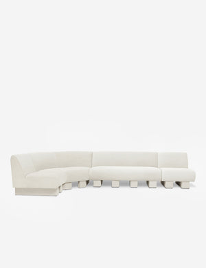Lena left-facing natural linen sectional sofa with upholstered beam legs.