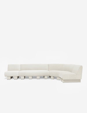 Lena right-facing natural linen sectional sofa with upholstered beam legs.